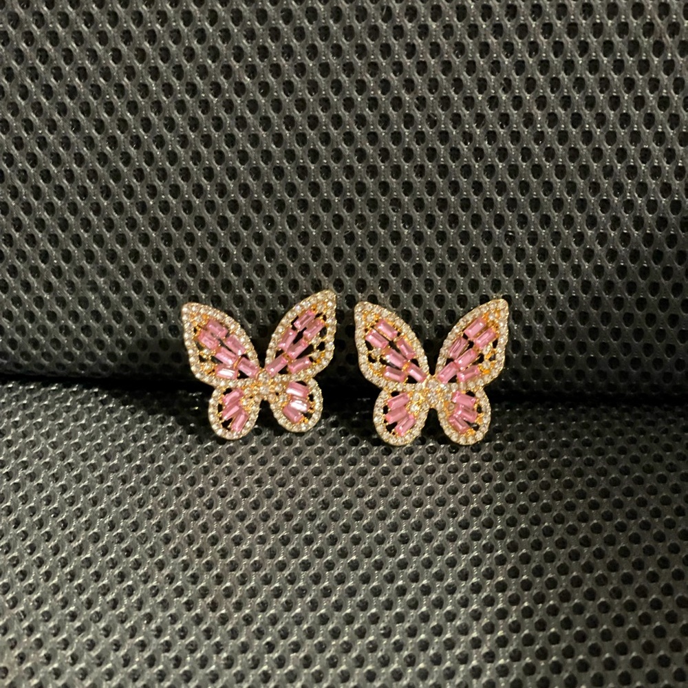 Pink butterfly earrings with crystals.